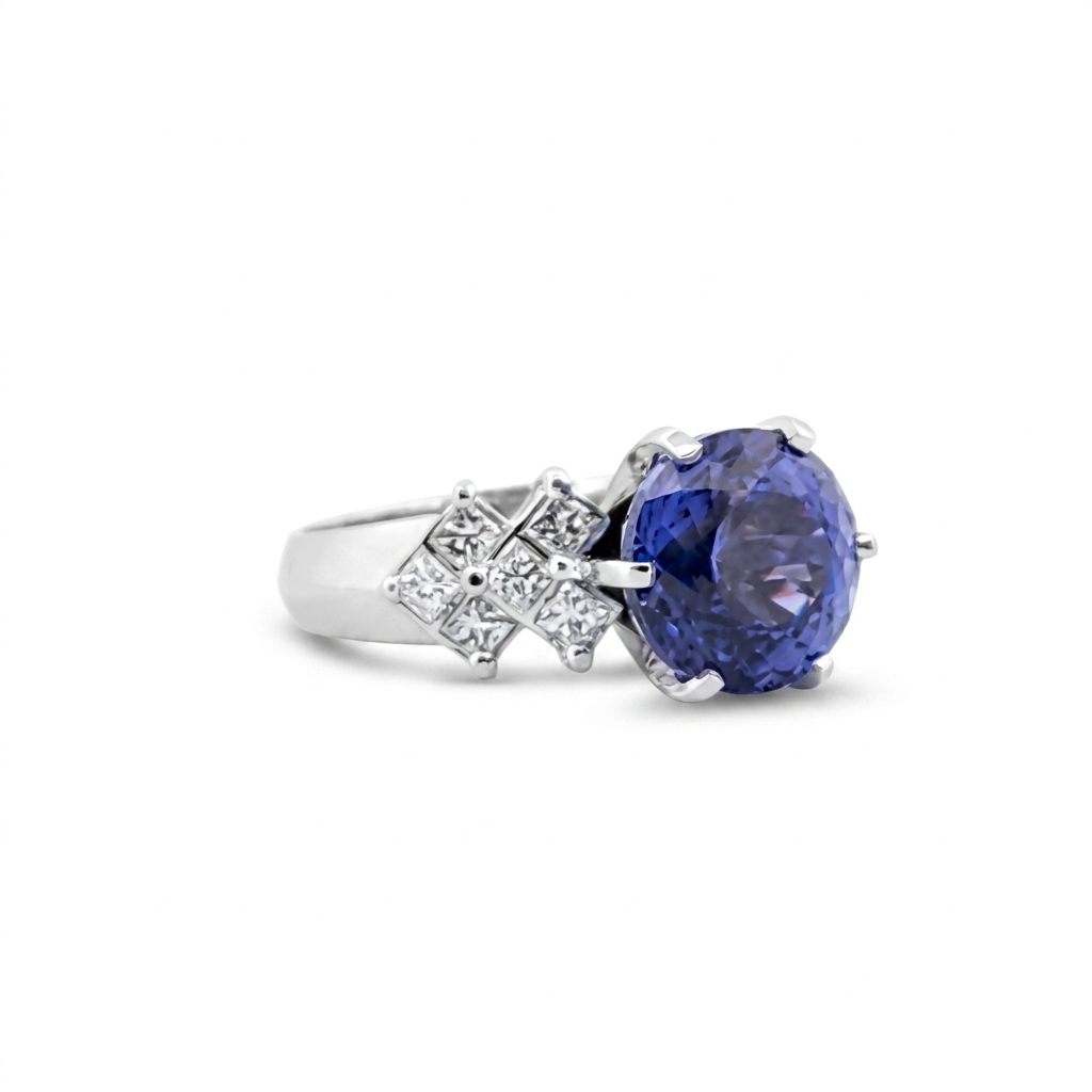 Natural Round Modified Brilliant Cut, Bluish Violet Tanzanite (5.25 CT - 10.20 mm) with 12 Natural Princess cut 3x3 mm Square Diamonds (1.92 CTW) Ring 14K White Gold. GIA Certified (2231466864).