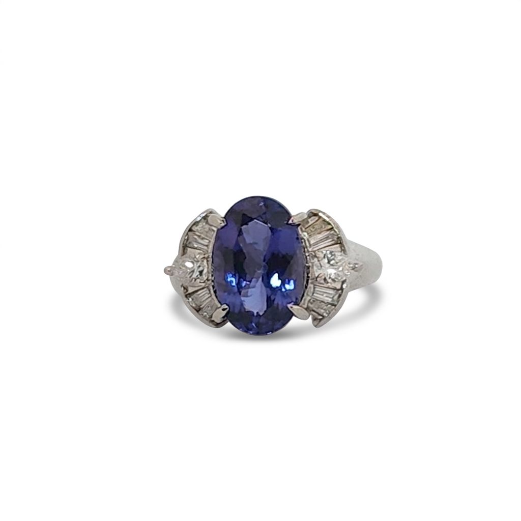Modified Brilliant Cut, Oval Shape, Bluish Violet Tanzanite (4.38CT, 12.77 x 8.29 x 5.57 mm), Mounted at Platinum 900 Ring with Natural Diamonds (0.60 CTW, E/F-VS). GIA Certified (5232466621). Size 5.75