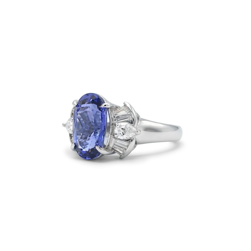Modified Brilliant Cut, Oval Shape, Bluish Violet Tanzanite (4.38CT, 12.77 x 8.29 x 5.57 mm), Mounted at Platinum 900 Ring with Natural Diamonds (0.60 CTW, E/F-VS). GIA Certified (5232466621). Size 5.75
