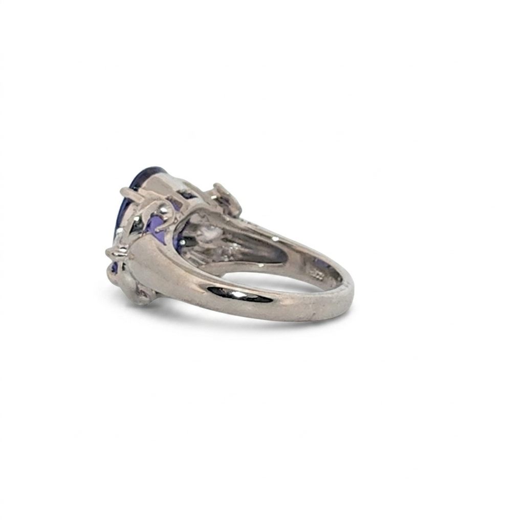 Modified Brilliant Cut, Oval Shape, Bluish Violet Tanzanite (4.38CT, 12.77 x 8.29 x 5.57 mm), Mounted at Platinum 900 Ring with Natural Diamonds (0.60 CTW, E/F-VS). GIA Certified (5232466621). Size 5.75