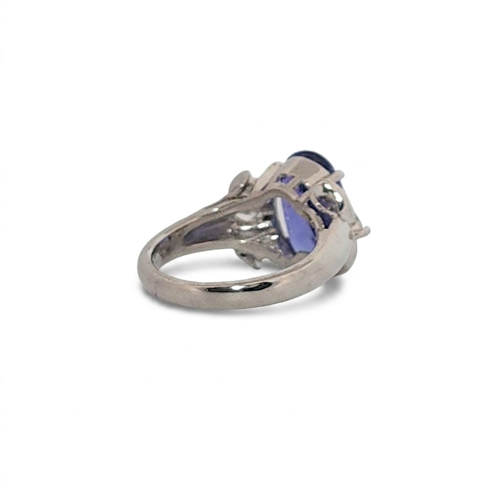 Modified Brilliant Cut, Oval Shape, Bluish Violet Tanzanite (4.38CT, 12.77 x 8.29 x 5.57 mm), Mounted at Platinum 900 Ring with Natural Diamonds (0.60 CTW, E/F-VS). GIA Certified (5232466621). Size 5.75