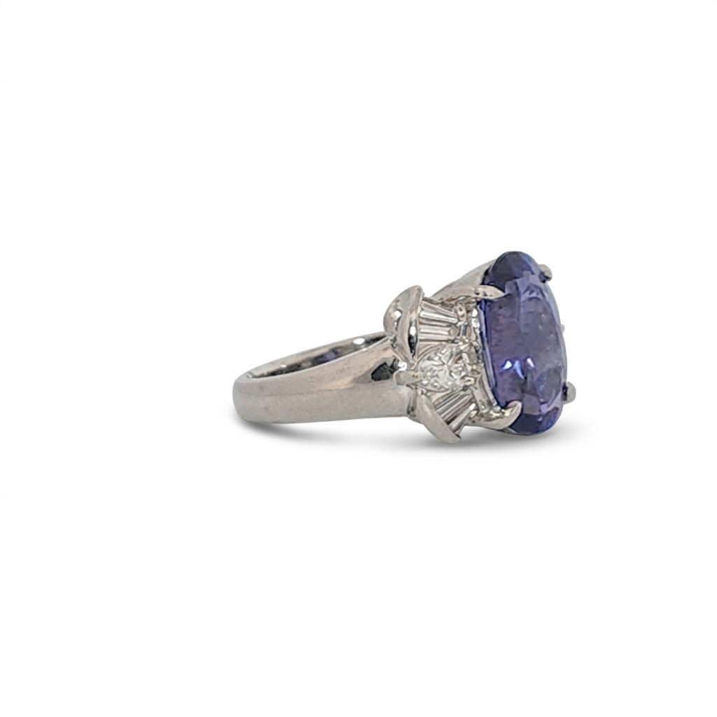 Modified Brilliant Cut, Oval Shape, Bluish Violet Tanzanite (4.38CT, 12.77 x 8.29 x 5.57 mm), Mounted at Platinum 900 Ring with Natural Diamonds (0.60 CTW, E/F-VS). GIA Certified (5232466621). Size 5.75