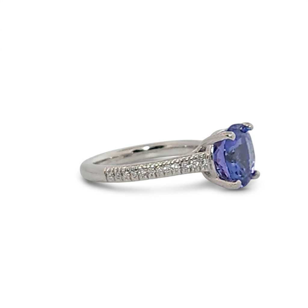 Modified Brilliant Cut, Round Shape, Bluish Violet Tanzanite (2.80CT, 8.89 - 9.01 x 5.53 mm), Mounted at Platinum 950 ring with Natural Diamonds (0.18 CTW E/F-SI). GIA Certified (5231466569). Size 5.25