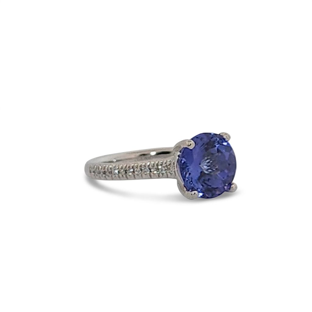Modified Brilliant Cut, Round Shape, Bluish Violet Tanzanite (2.80CT, 8.89 - 9.01 x 5.53 mm), Mounted at Platinum 950 ring with Natural Diamonds (0.18 CTW E/F-SI). GIA Certified (5231466569). Size 5.25