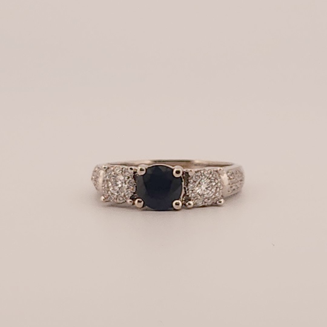 Three stone style Bridal Ring with 0.75 CT Natural Sapphire and 0.34CTW Natural Diamonds