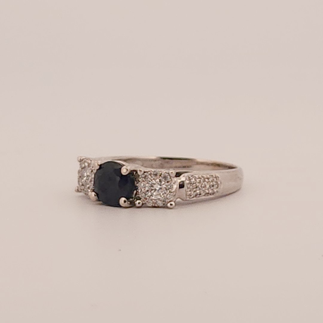 Three stone style Bridal Ring with 0.75 CT Natural Sapphire and 0.34CTW Natural Diamonds