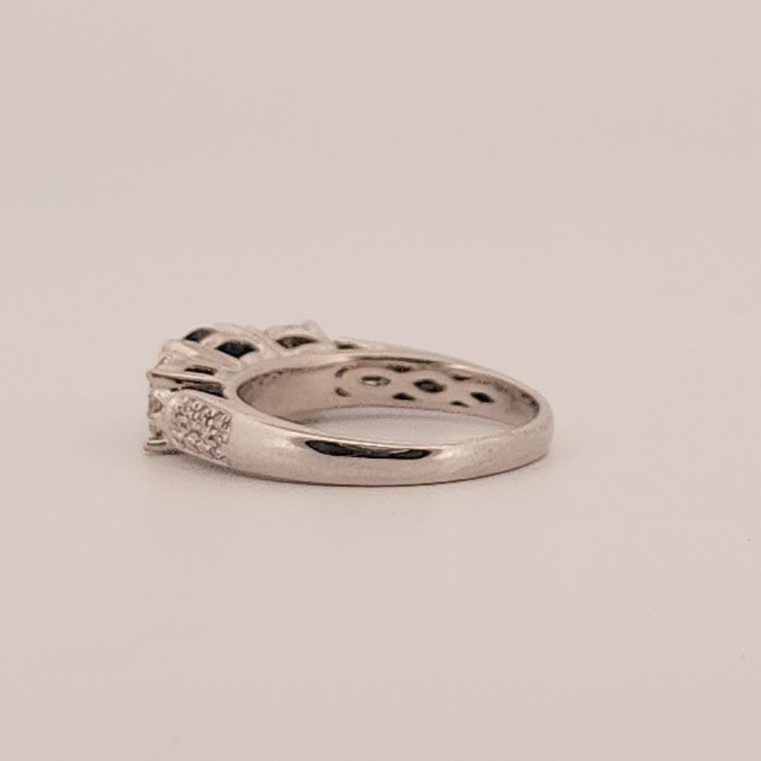 Three stone style Bridal Ring with 0.75 CT Natural Sapphire and 0.34CTW Natural Diamonds
