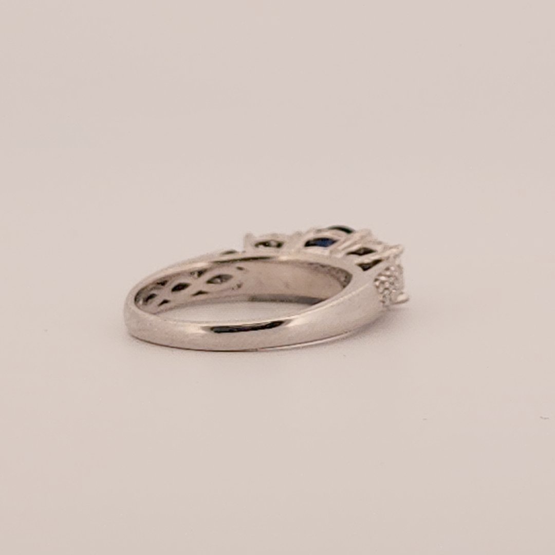 Three stone style Bridal Ring with 0.75 CT Natural Sapphire and 0.34CTW Natural Diamonds