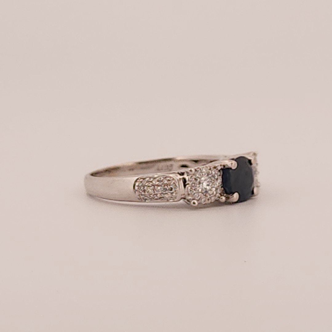 Three stone style Bridal Ring with 0.75 CT Natural Sapphire and 0.34CTW Natural Diamonds