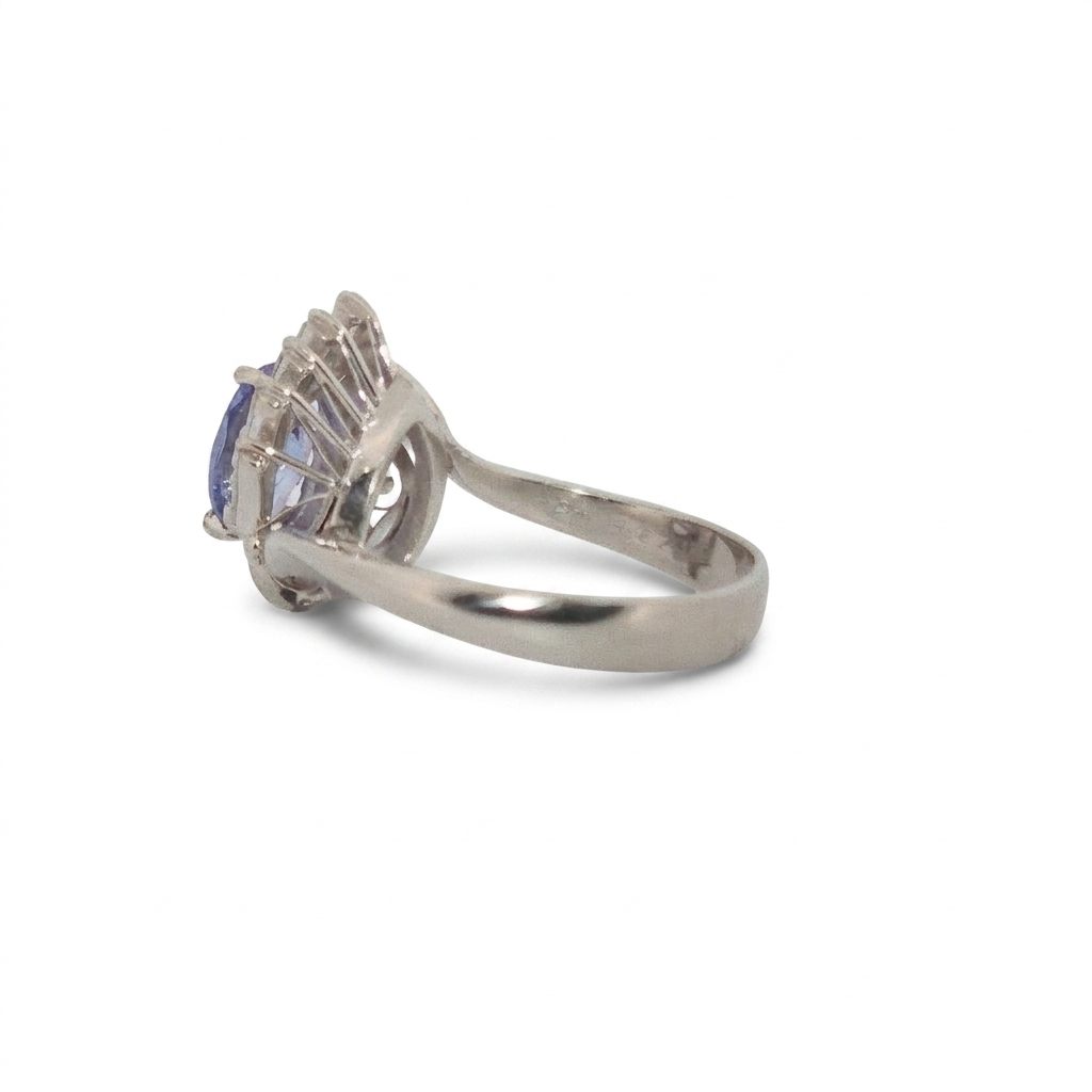 Oval Faceted, AAA, Natural Tanzanite (1.15CT, 8x6mm), Mounted on Platinum 900 Ring with Natural Diamonds (0.35 CTW, E/F-VS). Size 6
