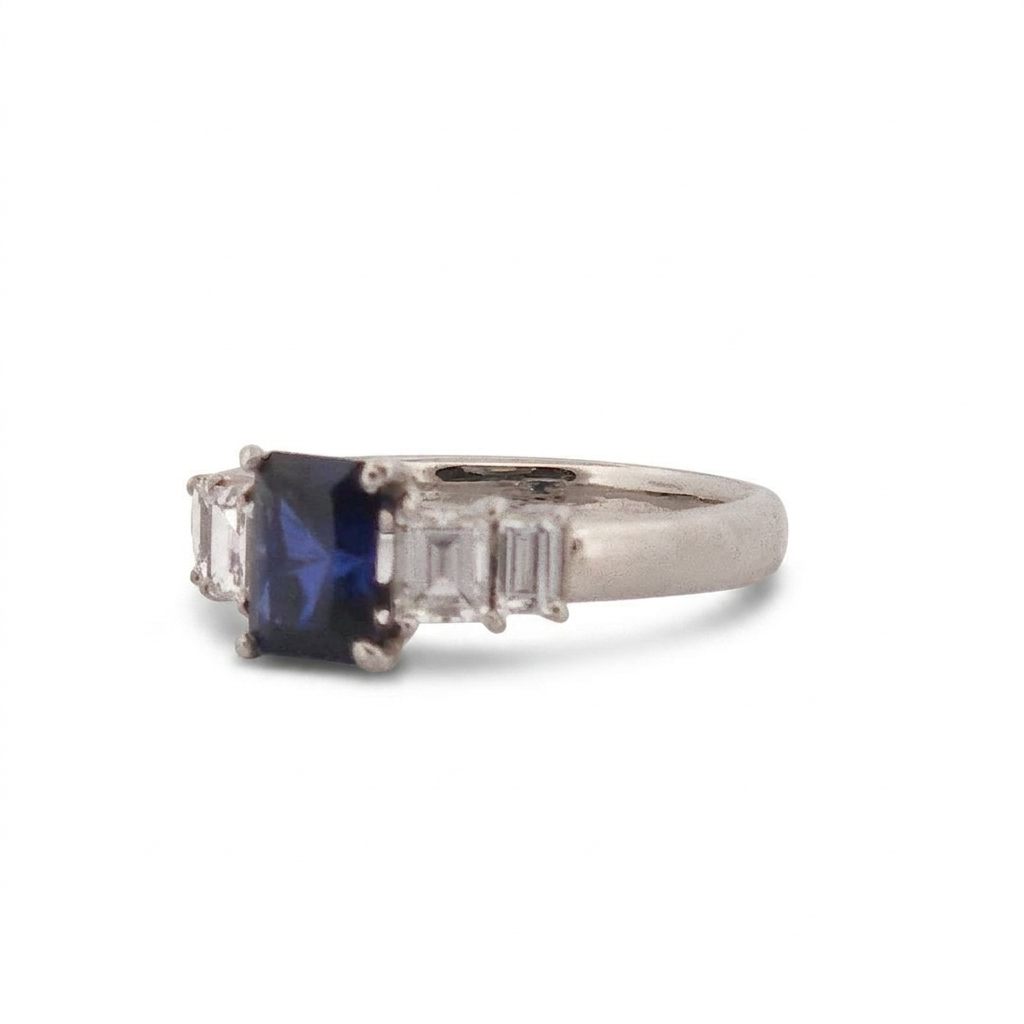 Emerald Step-Cut, AAA Natural Blue Sapphire (1.15CT, 7x5mm), Mounted on Platinum 900 Ring with Natural Diamonds (0.77 CTW, E/F VS1/VS2). Size 7.25