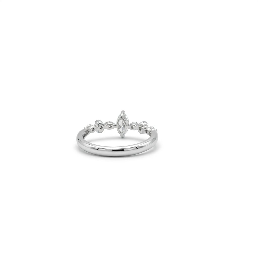 Platinum 900 Engagement Ring, size 6, set with 1 Marquise Diamond (0.28ct, I, SI2) and 6 Round Diamonds (0.15ct total, G, SI1).