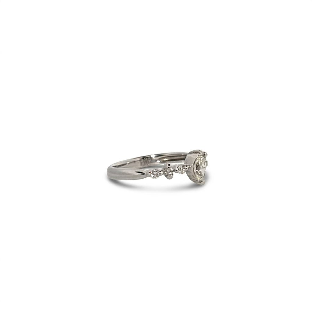Platinum 900 Engagement Ring, size 6, set with 1 Marquise Diamond (0.28ct, I, SI2) and 6 Round Diamonds (0.15ct total, G, SI1).