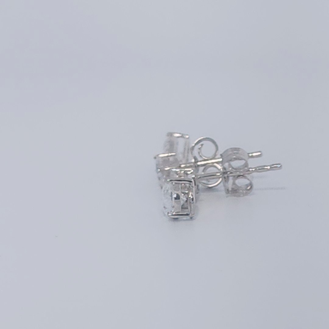 Female Diamond cluster Earrings, 2K White Gold, graduated pear and baguette-cut Diamonds totaling 1.88ct.