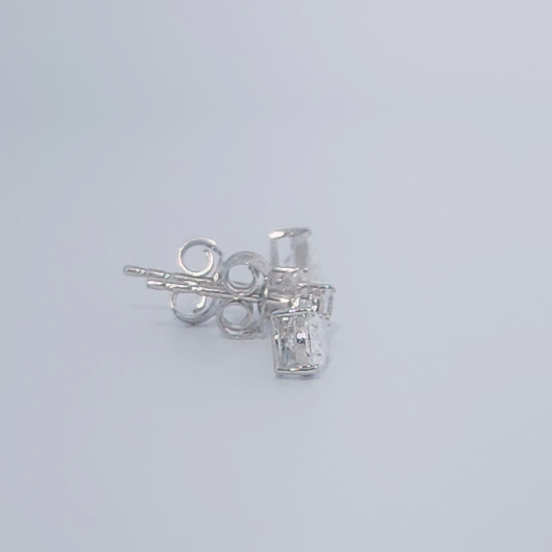 Female Diamond cluster Earrings, 2K White Gold, graduated pear and baguette-cut Diamonds totaling 1.88ct.
