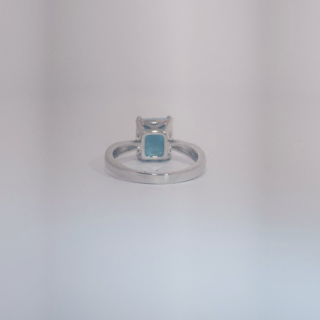 Women's Ring with rectangular Larimar cabochon, 9 Sterling Silver, bezel-set.