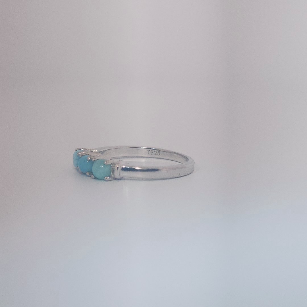 Women's Sterling Silver Ring with three bezel-set Larimar cabochons, size 7.