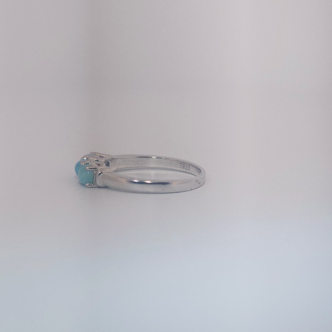 Women's Sterling Silver Ring with three bezel-set Larimar cabochons, size 7.