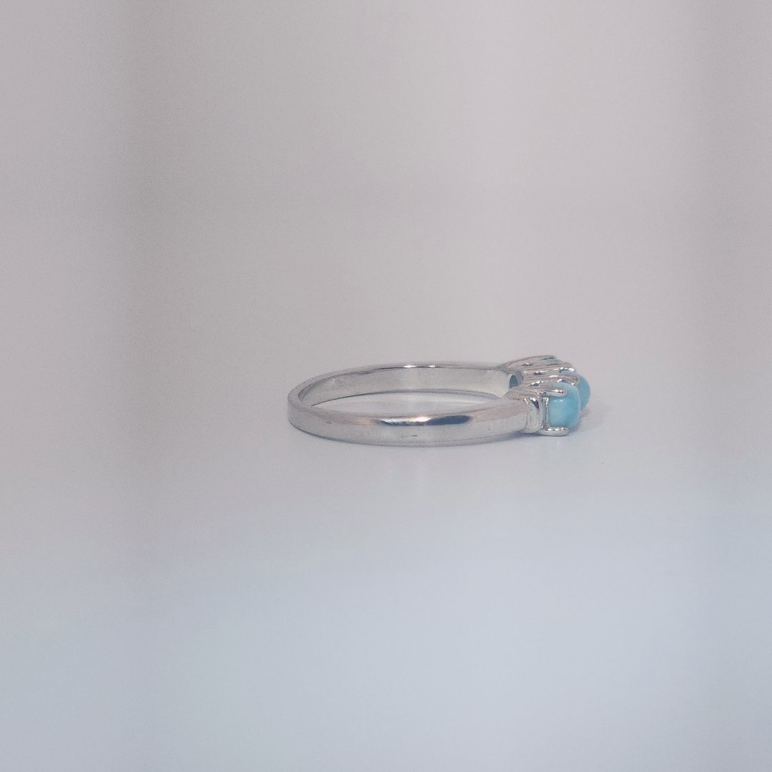 Women's Sterling Silver Ring with three bezel-set Larimar cabochons, size 7.