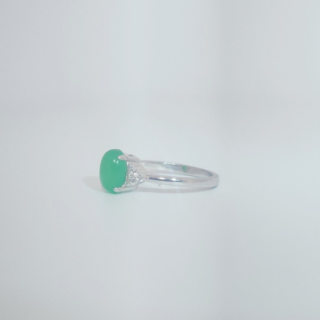 Women's Oval Jade Ring in 9 Sterling Silver with side white accent stones, size 7.