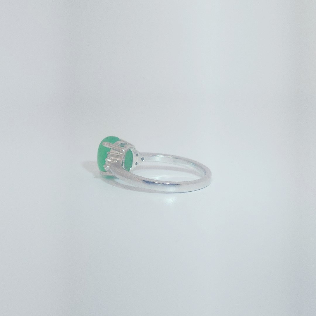 Women's Oval Jade Ring in 9 Sterling Silver with side white accent stones, size 7.
