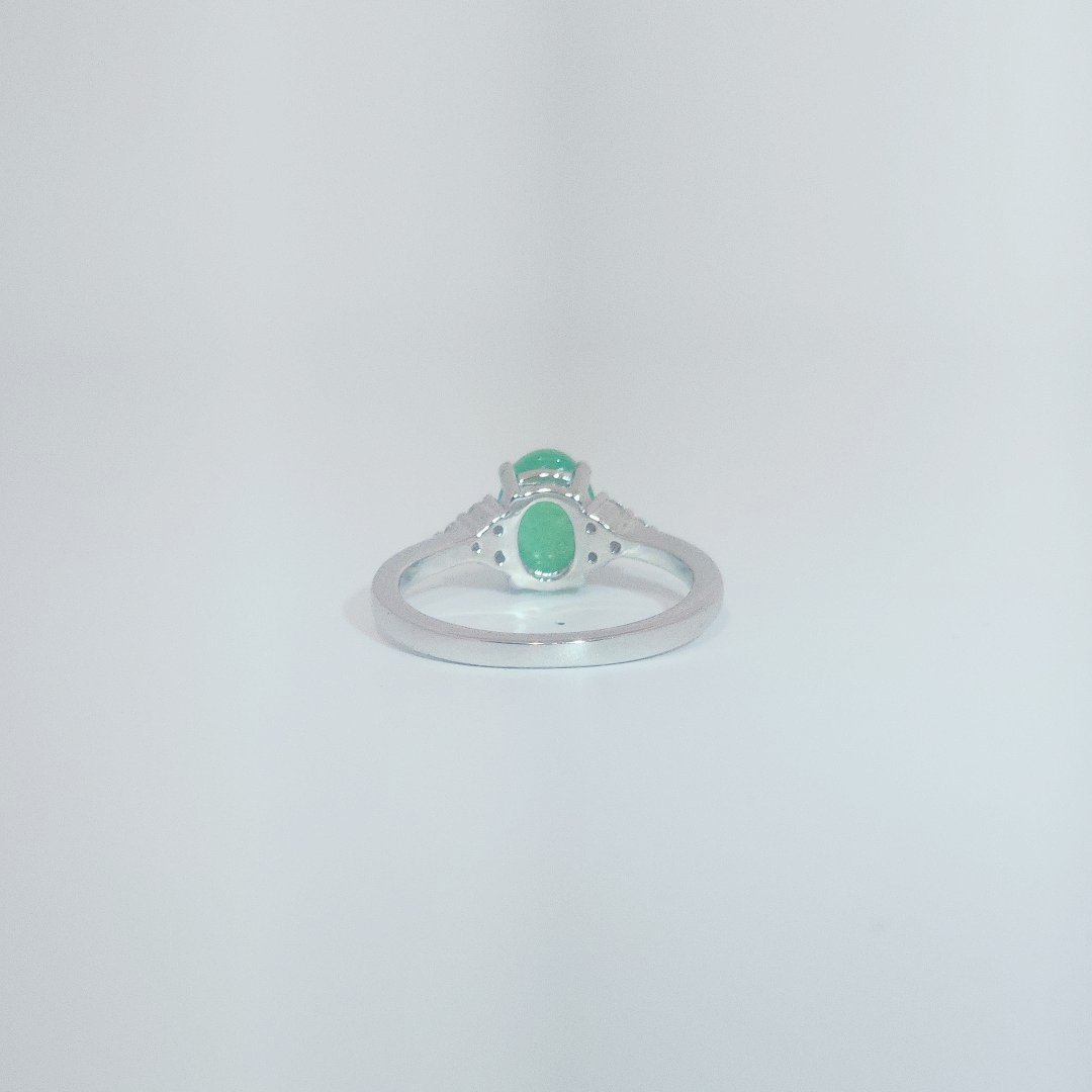 Women's Oval Jade Ring in 9 Sterling Silver with side white accent stones, size 7.