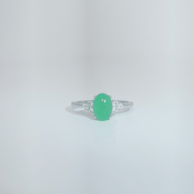 Women's Oval Jade Ring in 9 Sterling Silver with side white accent stones, size 7.