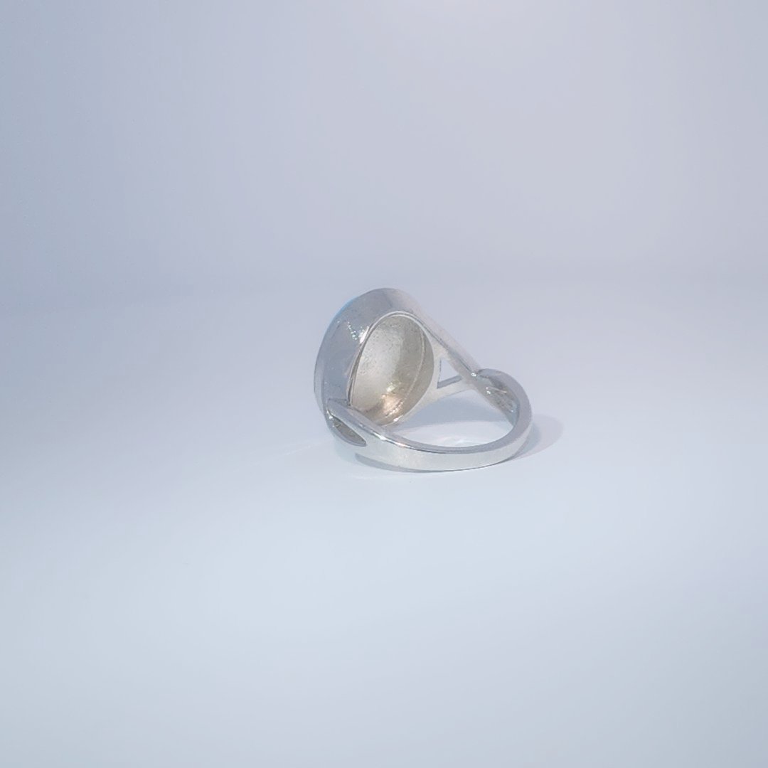 Women's ring with oval cabochon turquoise, set in 925 sterling silver band, size 7.
