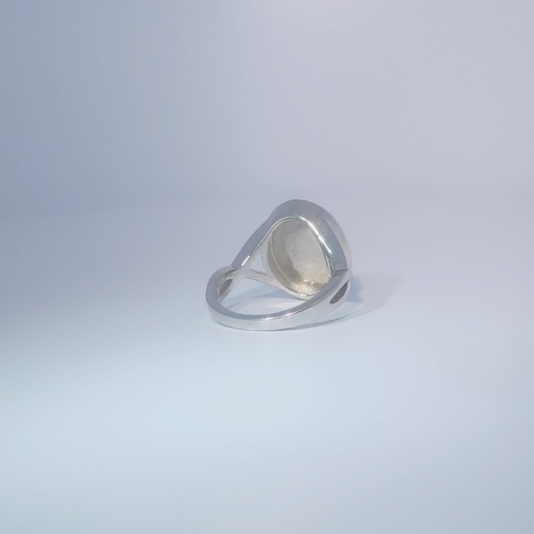 Women's ring with oval cabochon turquoise, set in 925 sterling silver band, size 7.