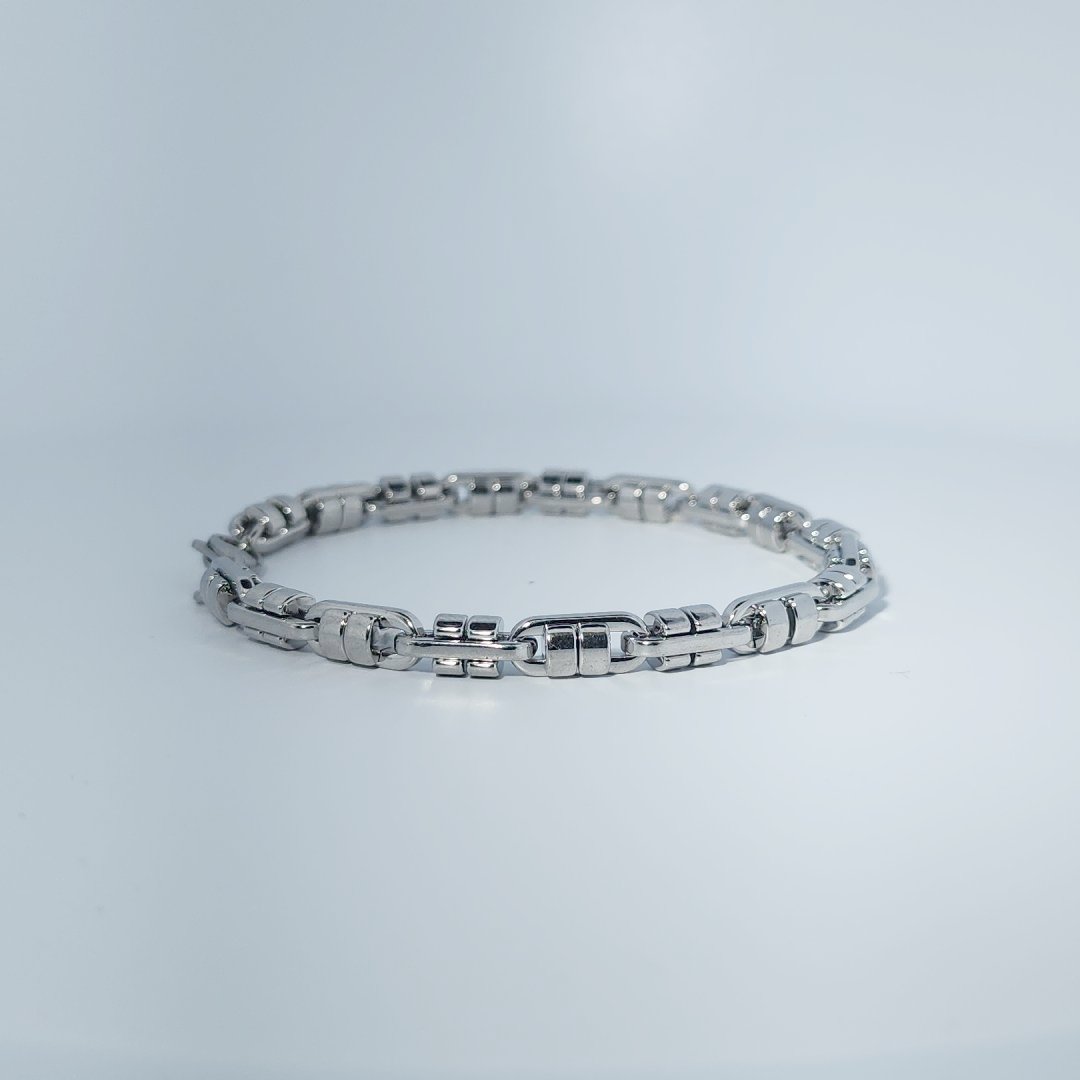 Unisex Stainless Steel Bracelet, linked design, polished finish.