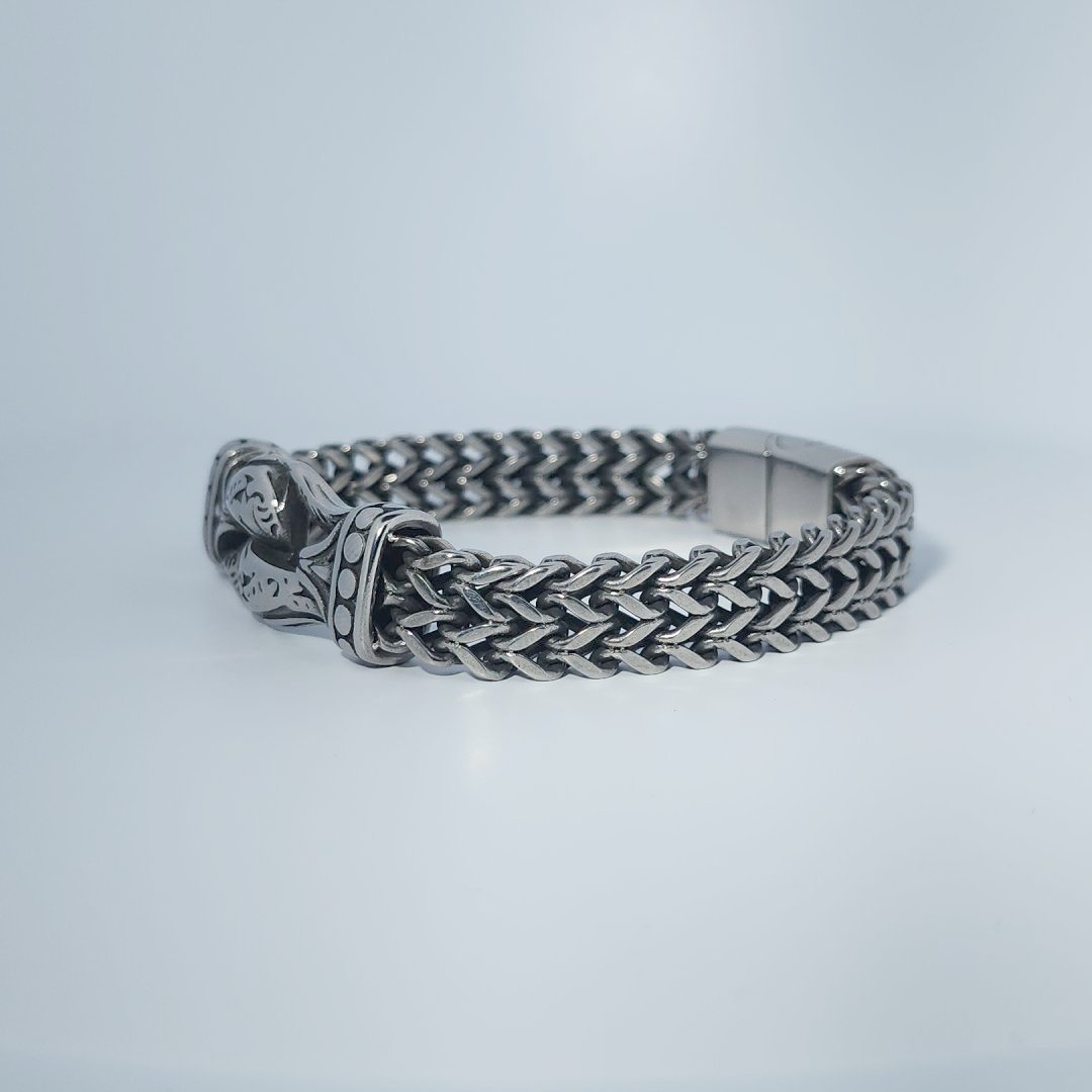 Stainless Steel Unisex Bracelet, 40g, with woven design and engraved clasp detail.