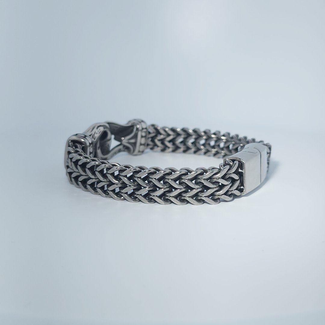 Stainless Steel Unisex Bracelet, 40g, with woven design and engraved clasp detail.