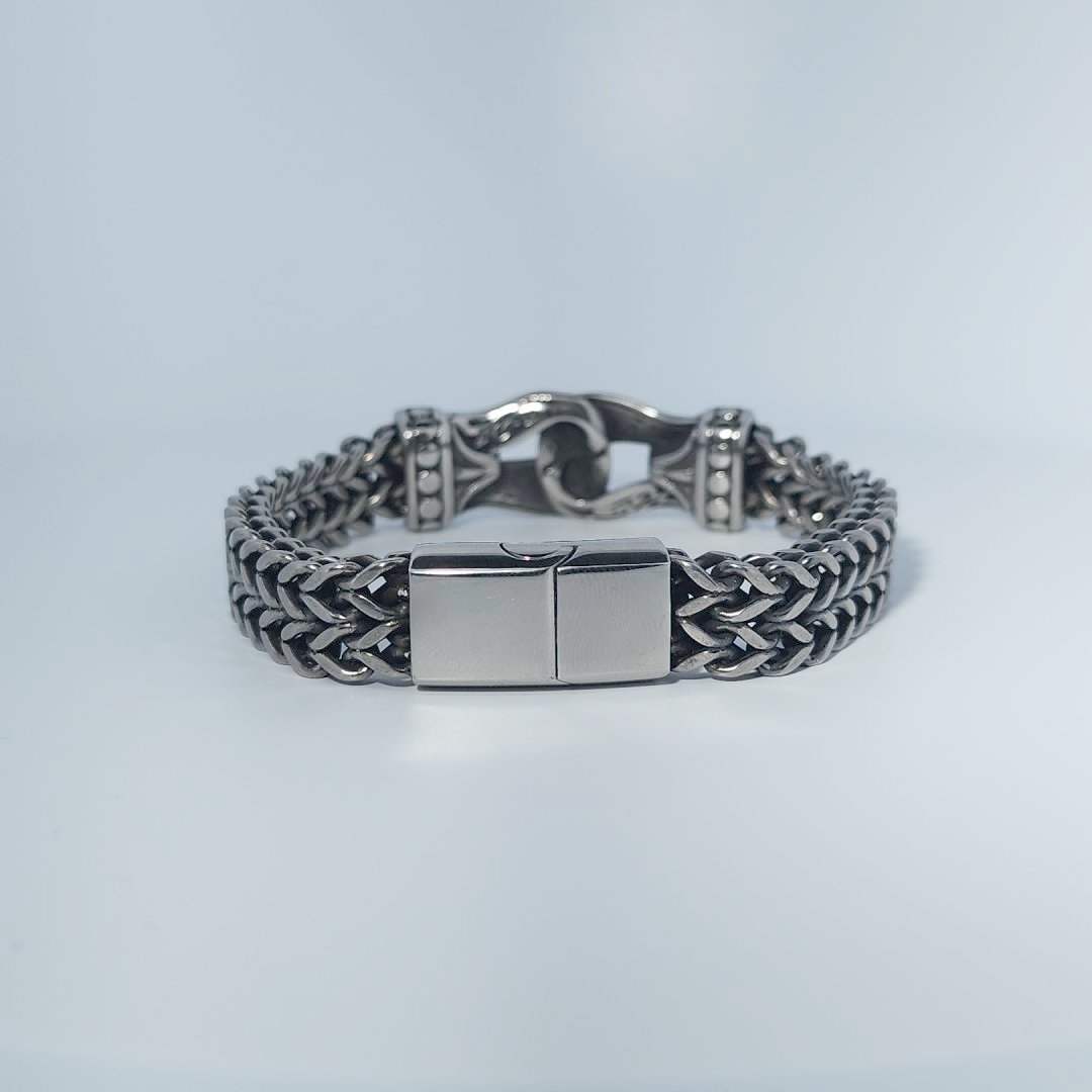 Stainless Steel Unisex Bracelet, 40g, with woven design and engraved clasp detail.