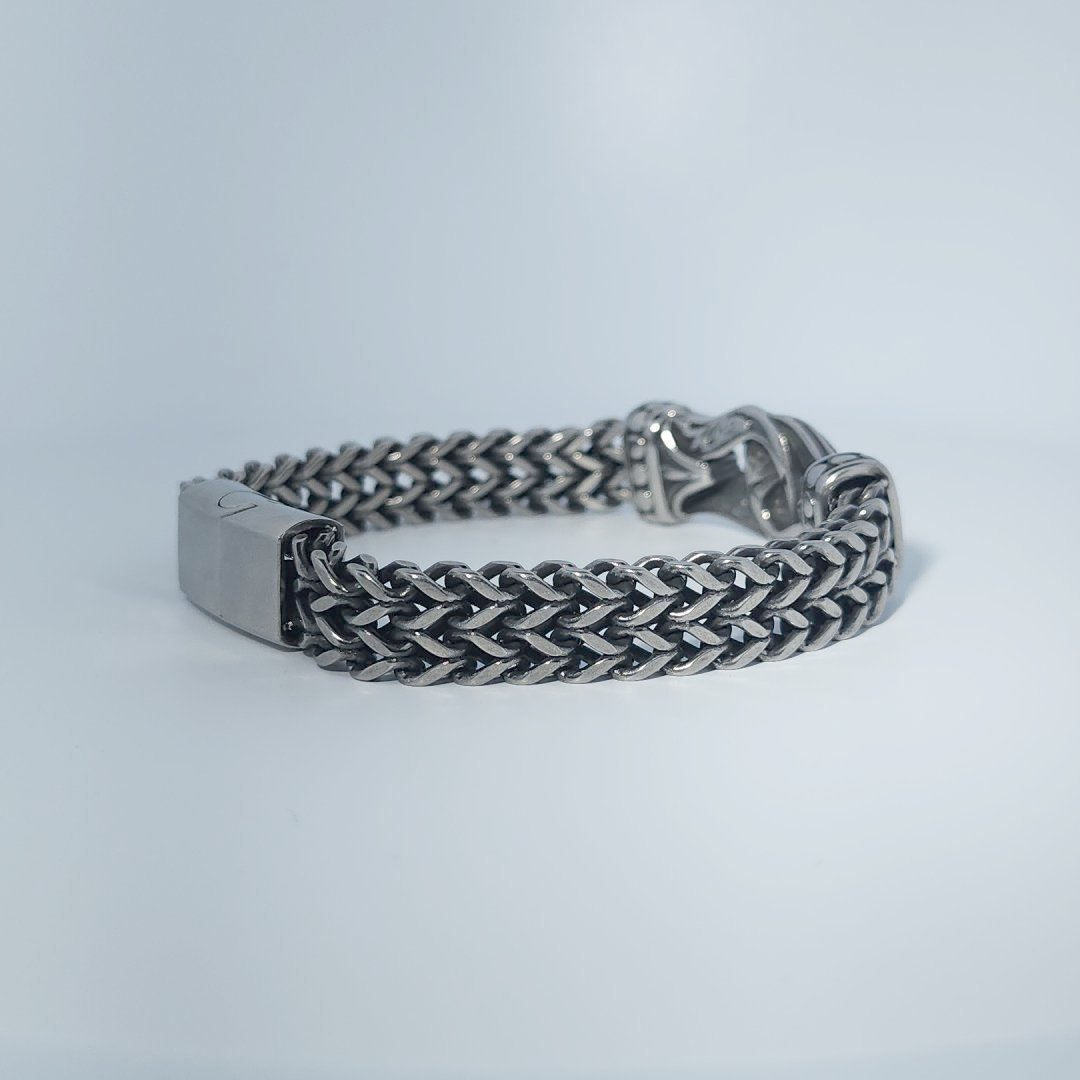 Stainless Steel Unisex Bracelet, 40g, with woven design and engraved clasp detail.