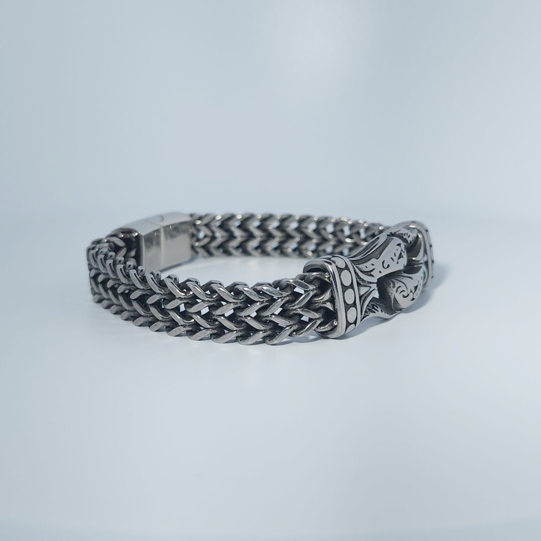 Stainless Steel Unisex Bracelet, 40g, with woven design and engraved clasp detail.