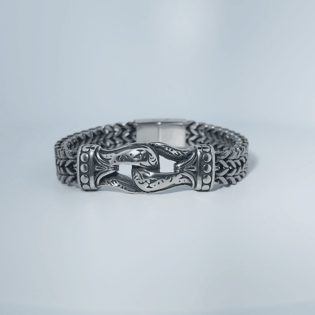 Stainless Steel Unisex Bracelet, 40g, with woven design and engraved clasp detail.