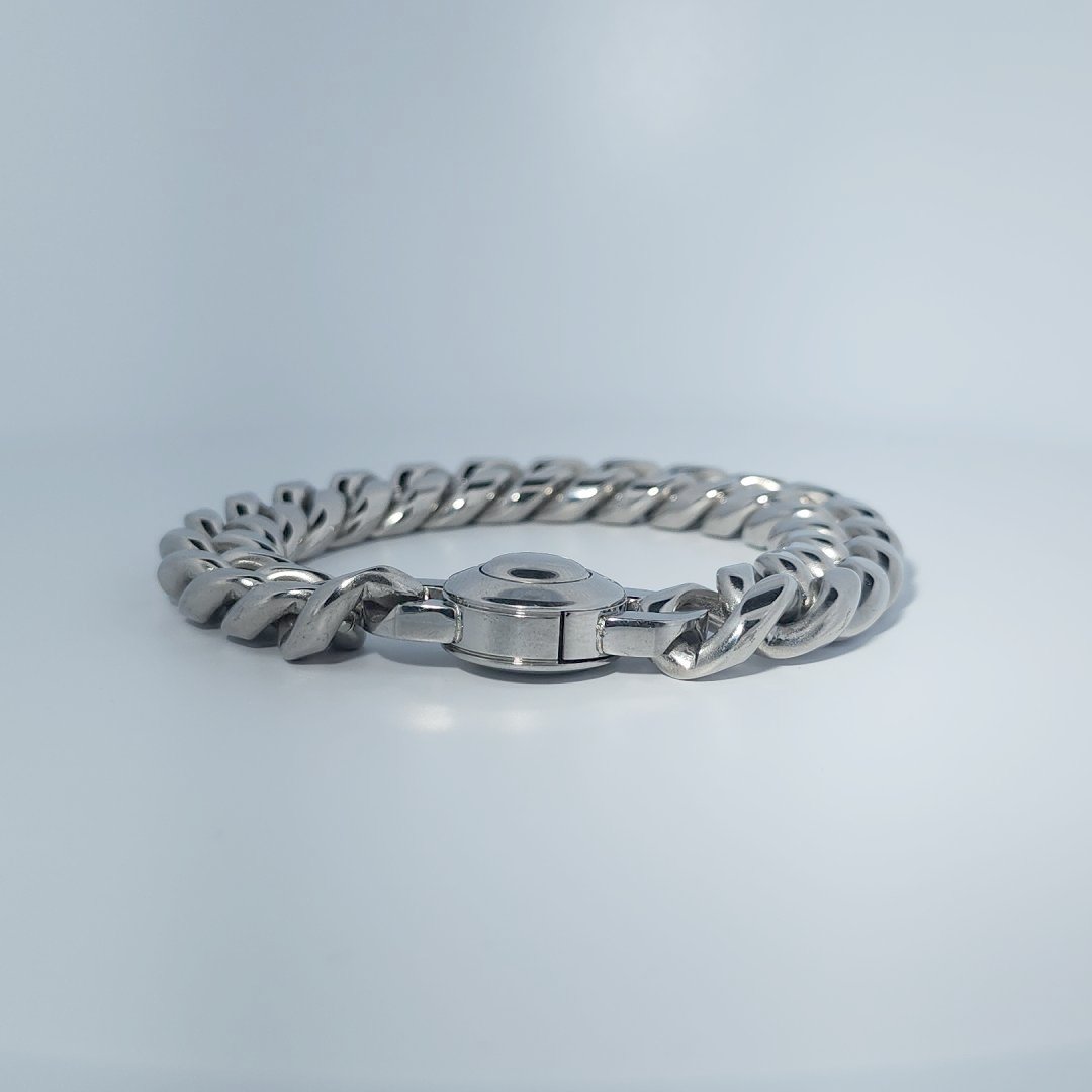 Male Stainless Steel Bracelet, curb chain design with a circular clasp.