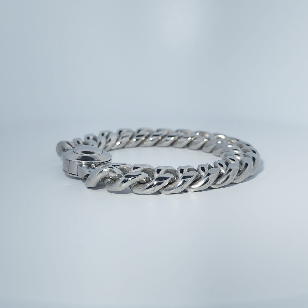 Male Stainless Steel Bracelet, curb chain design with a circular clasp.