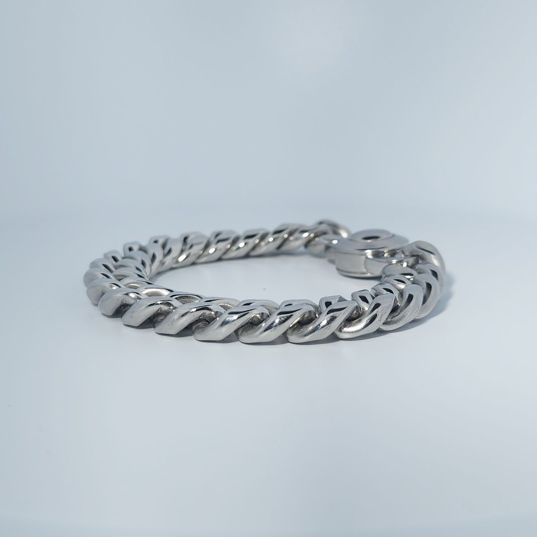 Male Stainless Steel Bracelet, curb chain design with a circular clasp.
