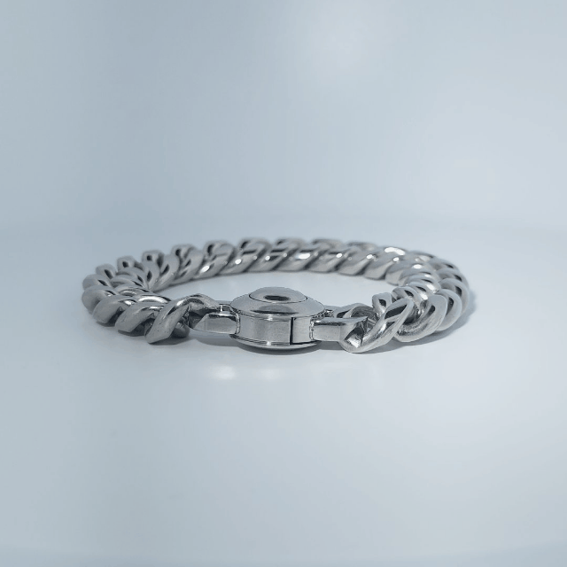 Male Stainless Steel Bracelet, curb chain design with a circular clasp.