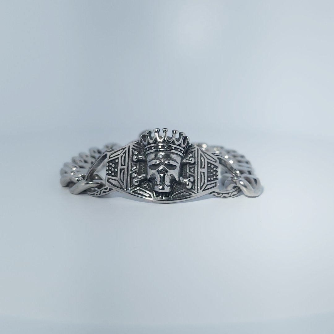 Male Stainless Steel Bracelet with a crowned skull and chain link design.