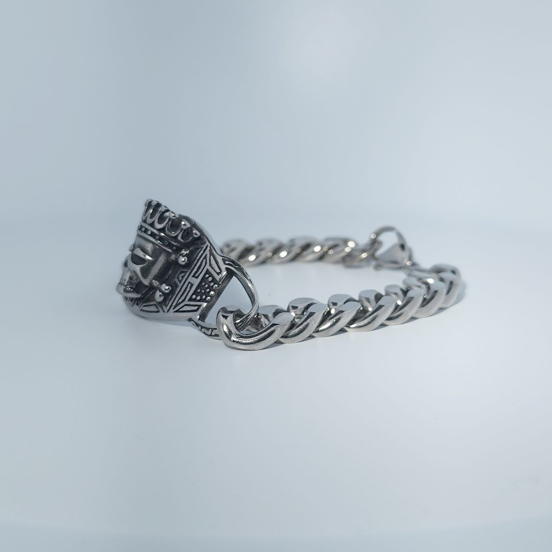 Male Stainless Steel Bracelet with a crowned skull and chain link design.