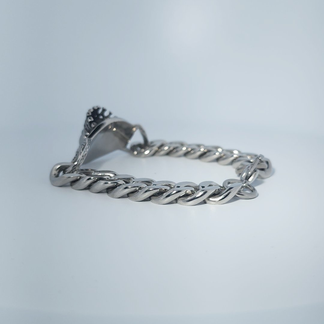 Male Stainless Steel Bracelet with a crowned skull and chain link design.