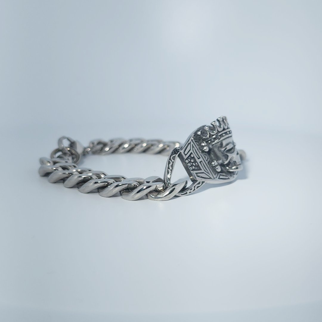 Male Stainless Steel Bracelet with a crowned skull and chain link design.