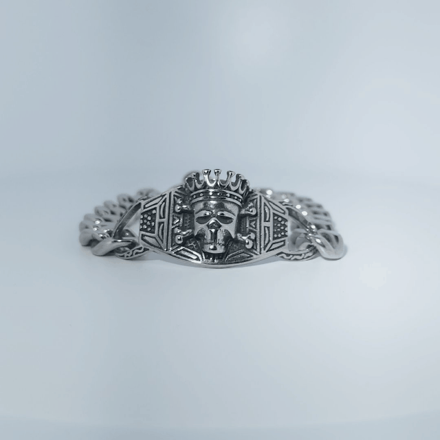 Male Stainless Steel Bracelet with a crowned skull and chain link design.
