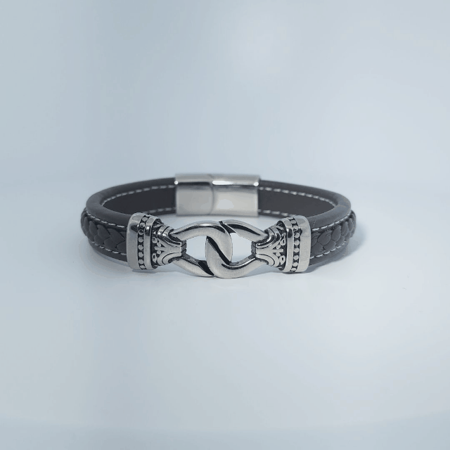 Men's Bracelet in Stainless Steel and Brown Leather with Decorative Clasp and Stitching Detail.