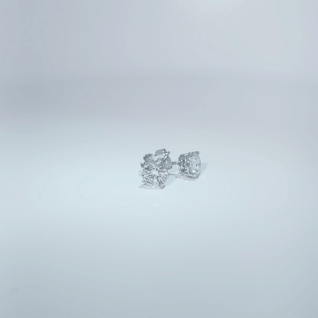 DATA_MISMATCH: Pair of earrings vs 1 Lab Grown Diamond stated | 14K White Gold Earrings, set with 1 Lab Grown Diamond (2.28ct), 0.87g, Size 7.