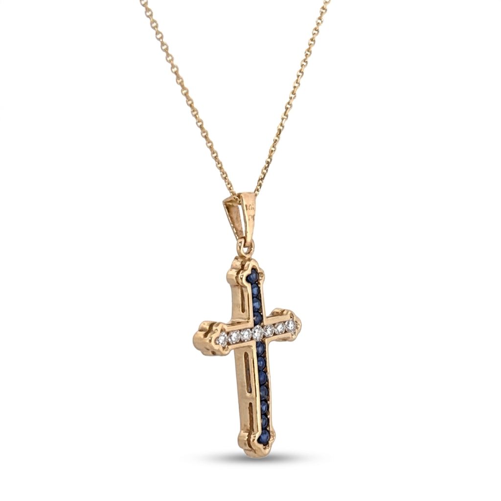 14K Yellow Gold Cross Necklace, set with 12 Blue Sapphire and 12 Diamond stones.