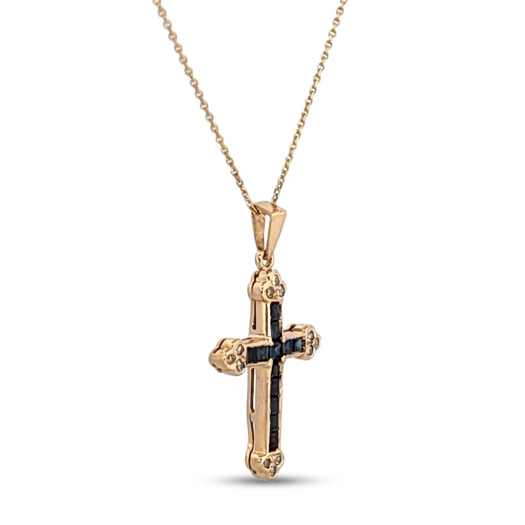 14K Yellow Gold Cross Necklace, set with 12 Blue Sapphire and 12 Diamond stones.