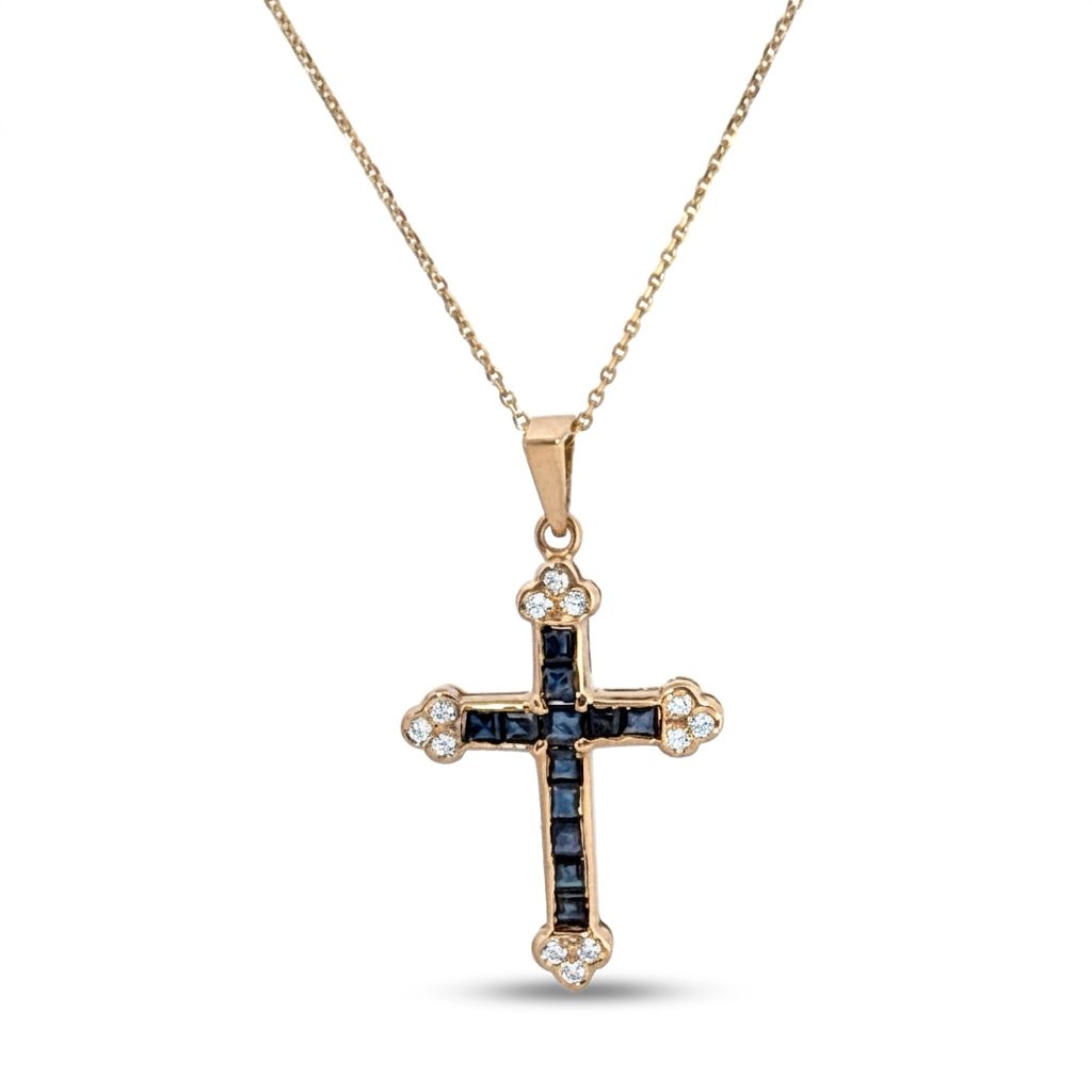 14K Yellow Gold Cross Necklace, set with 12 Blue Sapphire and 12 Diamond stones.